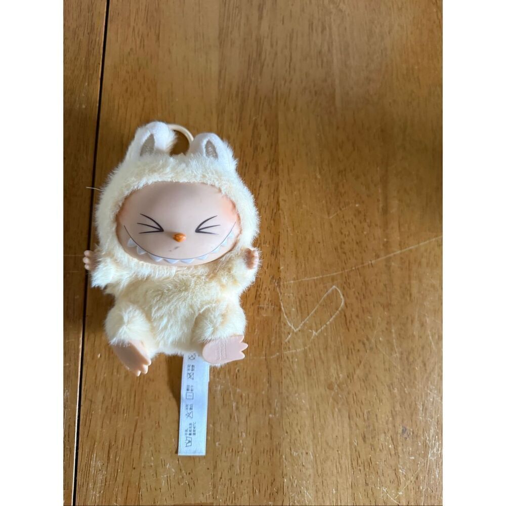 Pop Mart Labubu plush keychain cream/ivory version Have a Seat